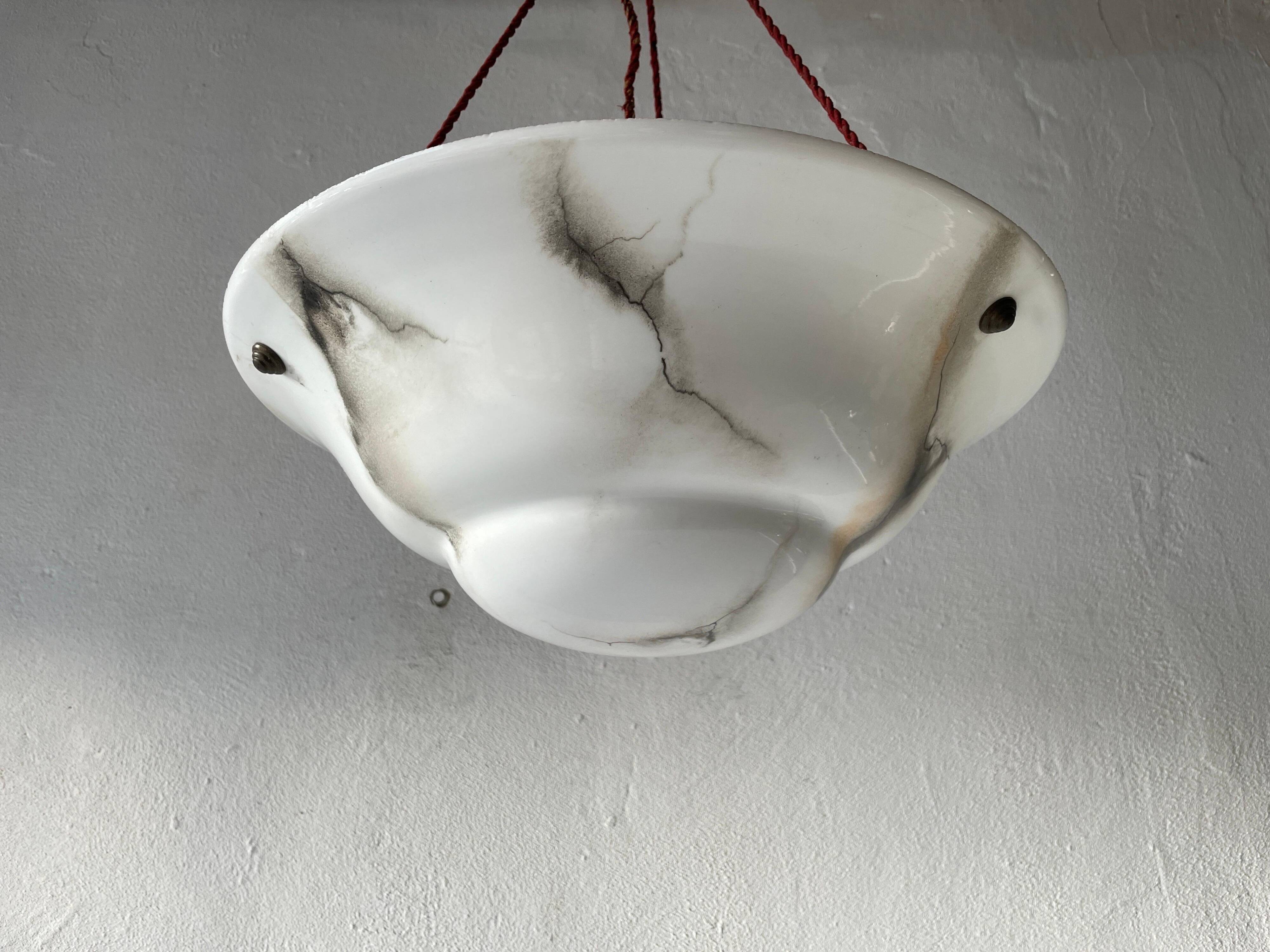 Art Deco suspended lamp in white marble-effect glass, 1940s, Germany.