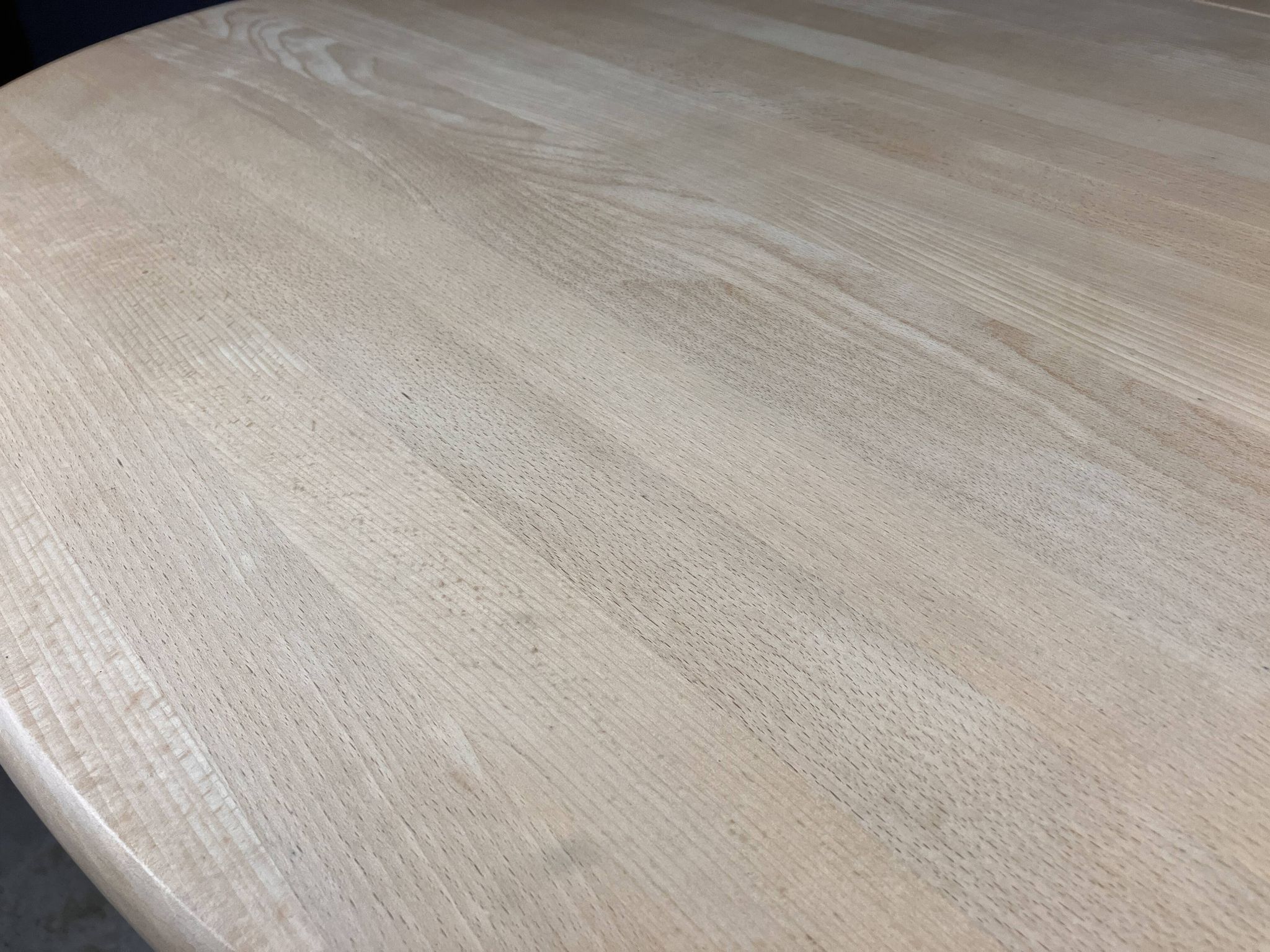 Oval extendable dining table in beech with Danish design.