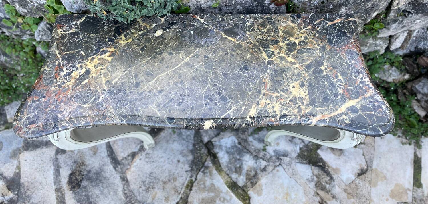 Wall console in painted, carved and molded wood in Louis XV style.