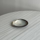 Mother-of-pearl pocket emptier