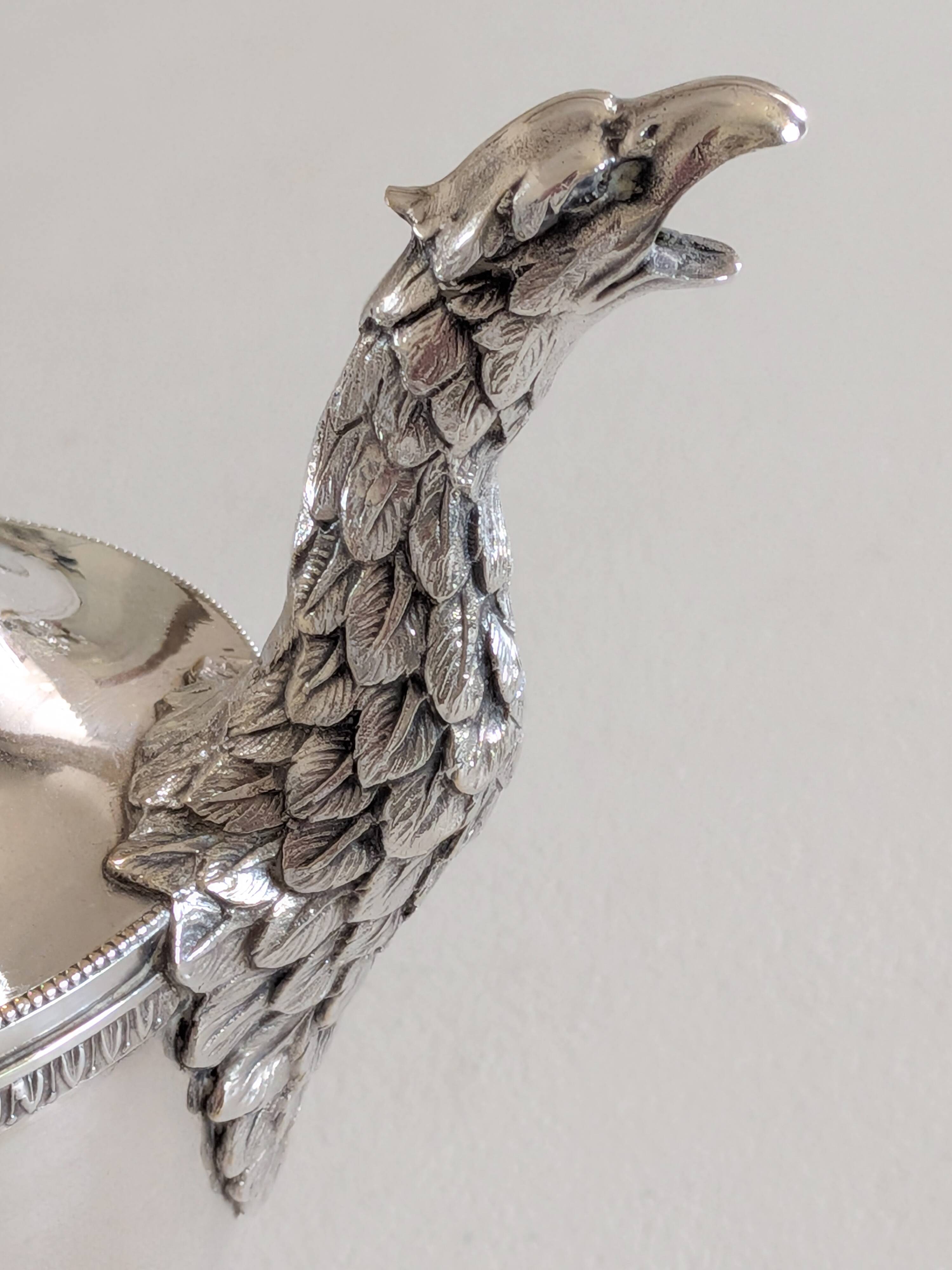 Empire-style silver-plated coffee pot with eagle head spout.