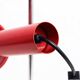 Red metal articulated desk lamp