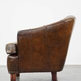 Stylish armchair with a unique design and beautiful finish, made of leather