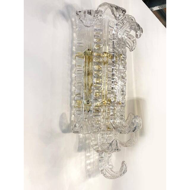 Contemporary transparent "lingue" murano glass wall lamp in barovier style