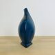 Blue ceramic vase, triangular and pot-bellied