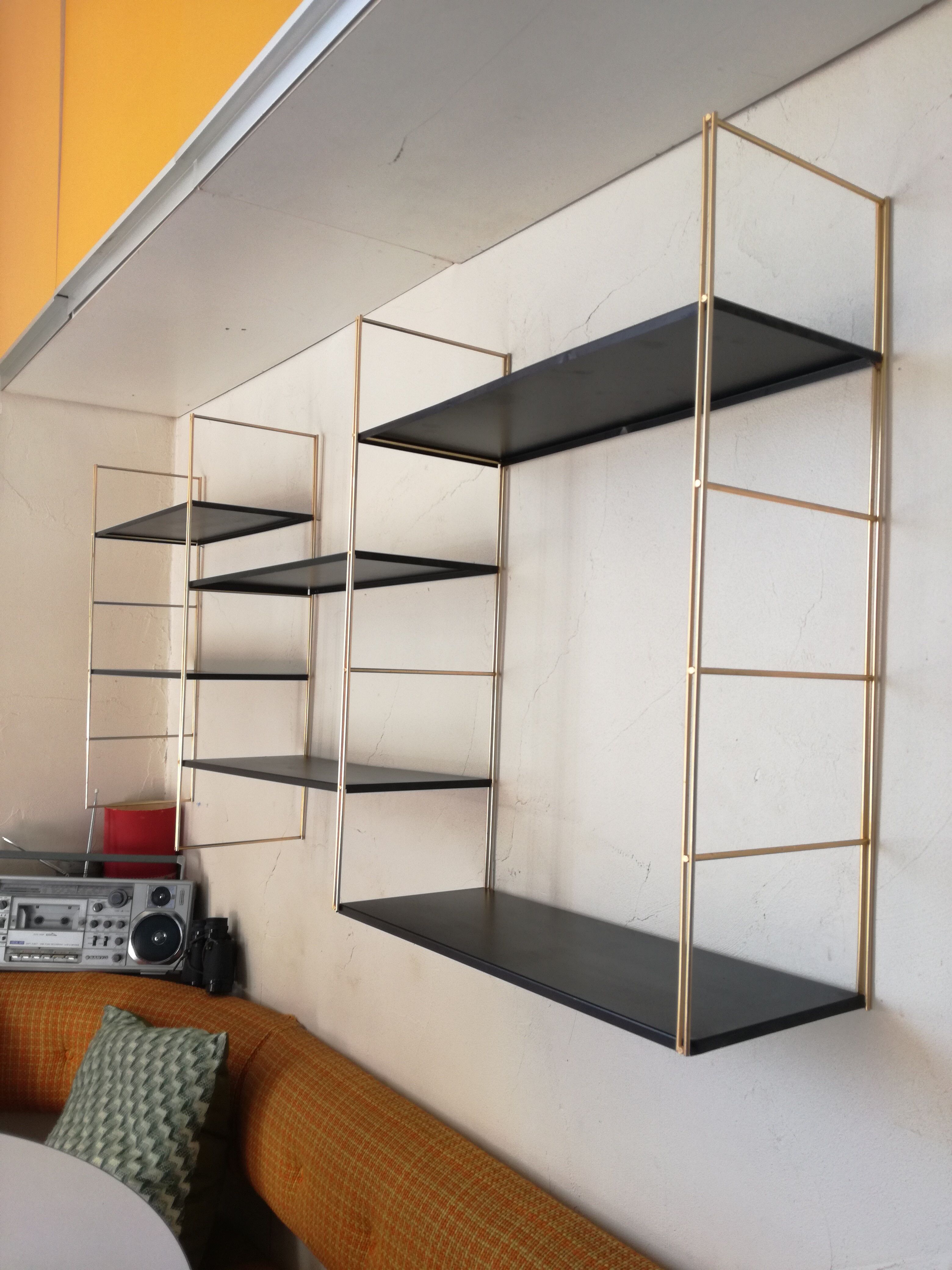 Gold and black thong shelf