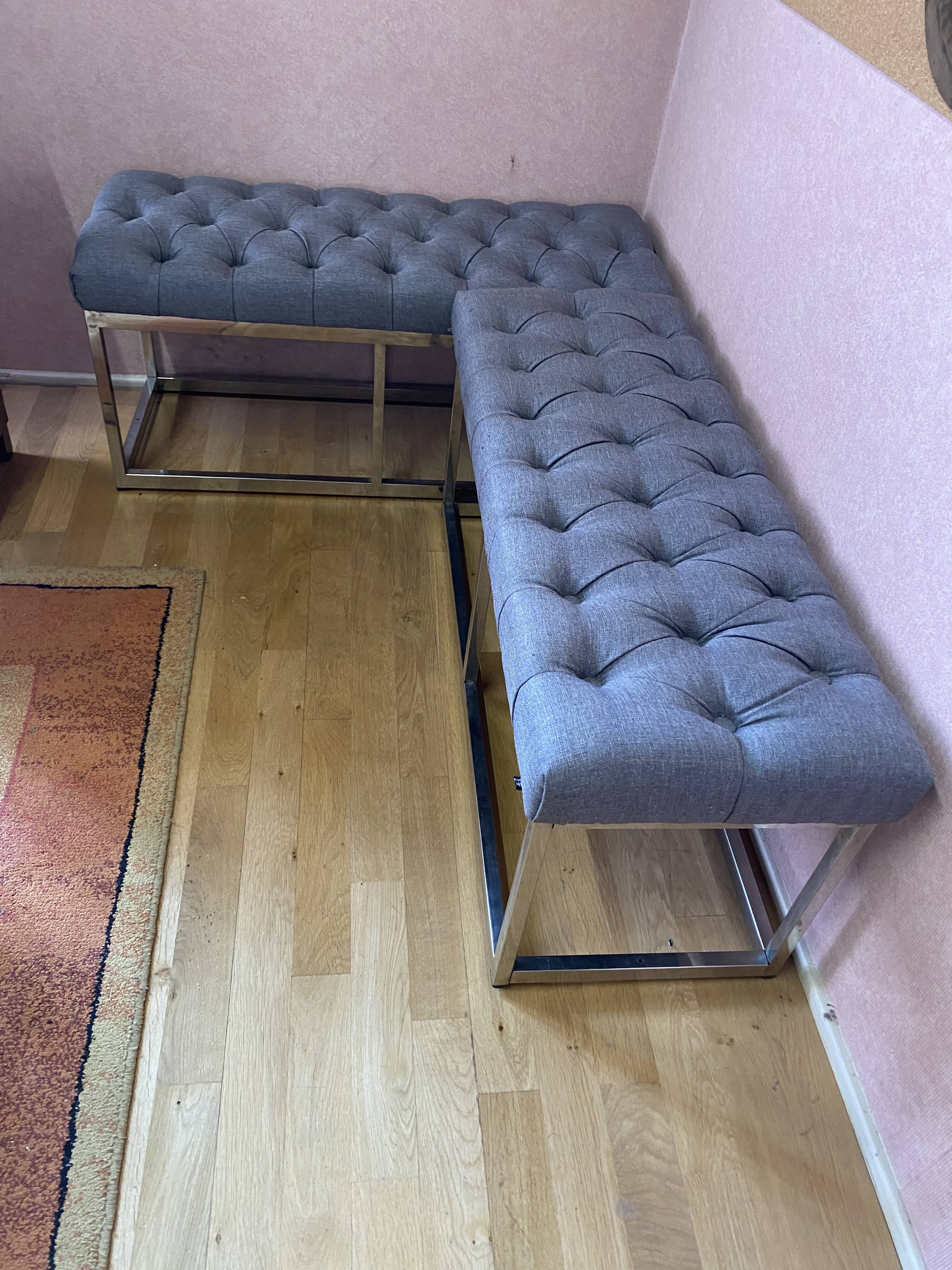 Pair of benches in chrome metal and padded gray fabric