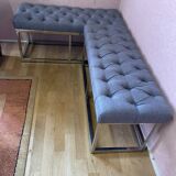 Pair of benches in chrome metal and padded gray fabric
