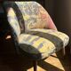 J. Tenreiro, Brazil. Concha armchair with tapered legs, Cluny tapestry 1400.