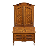Louis XV style secretary bookcase with marquetry from the period.