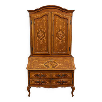 Louis XV style secretary bookcase with marquetry from the period.