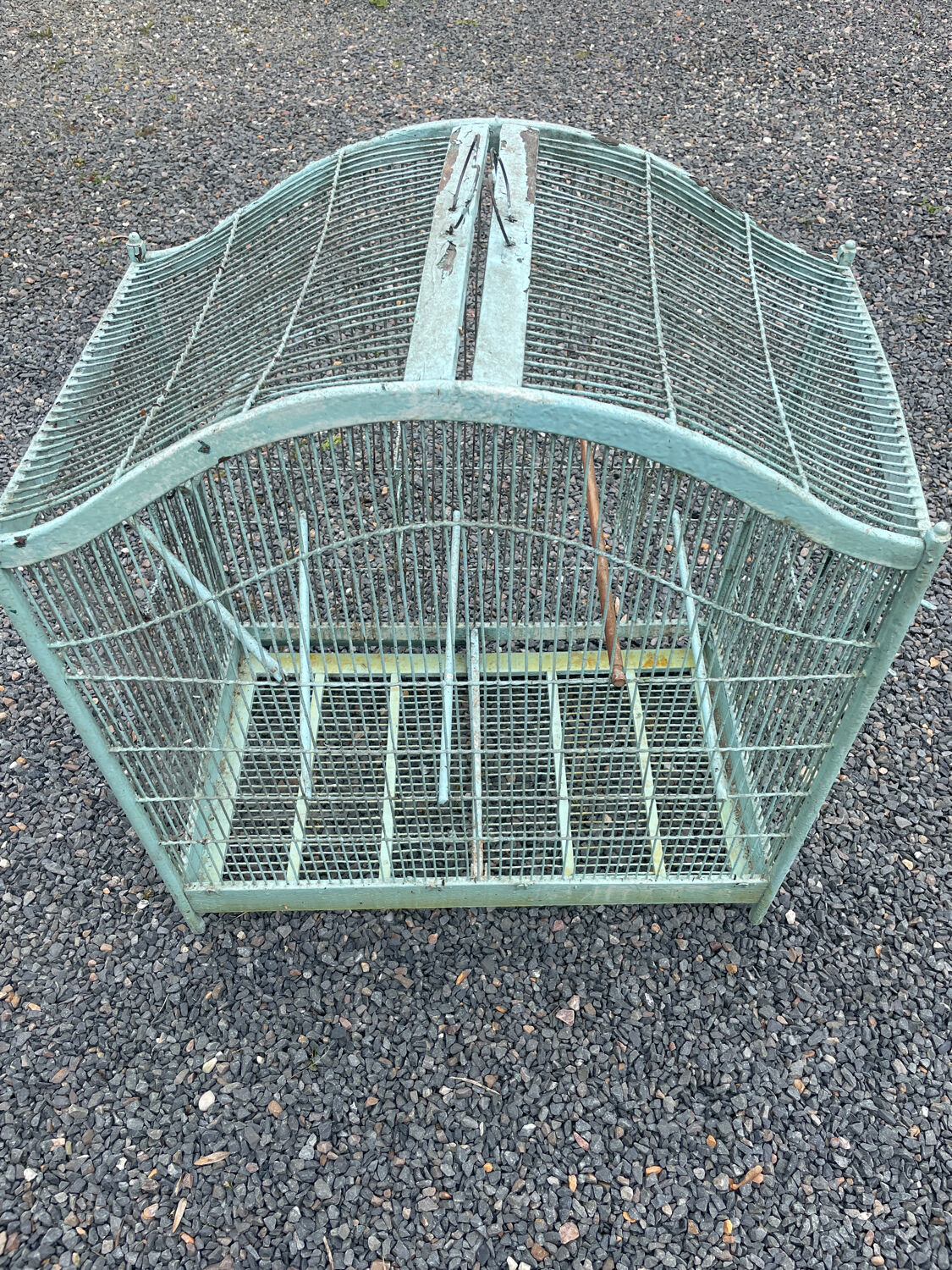 Old wooden and metal birdcage