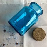 Blue glass jar with Henkel cork stopper - vintage