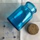 Blue glass jar with Henkel cork stopper - vintage