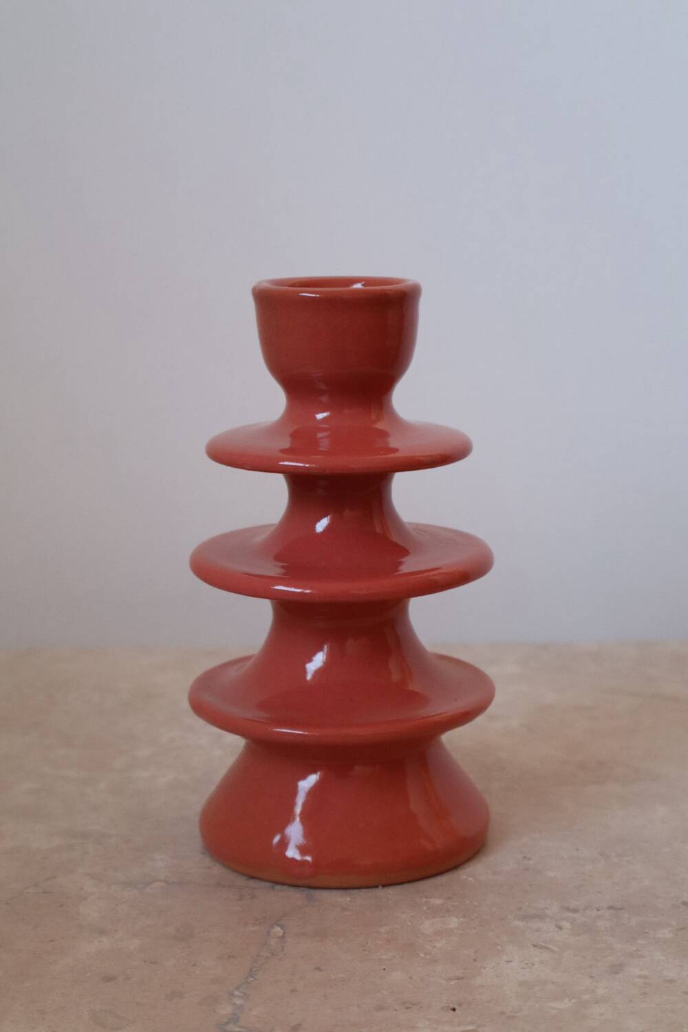 Dark pink ceramic candlestick