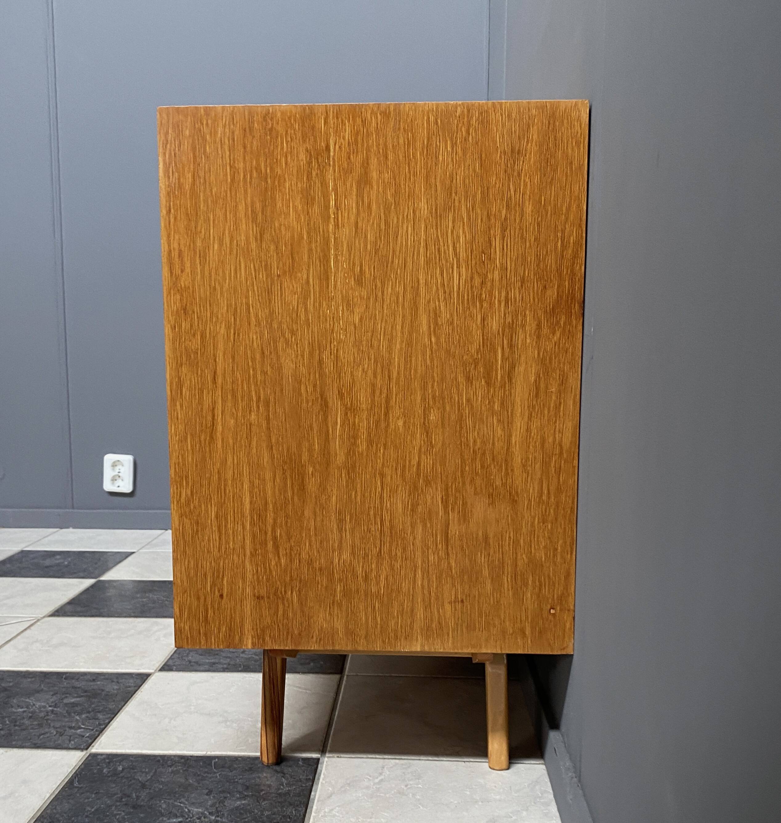 Blonde wood buffet Jiri Jiroutek, model U458 from the 1960s, with 4 drawers and a door.
