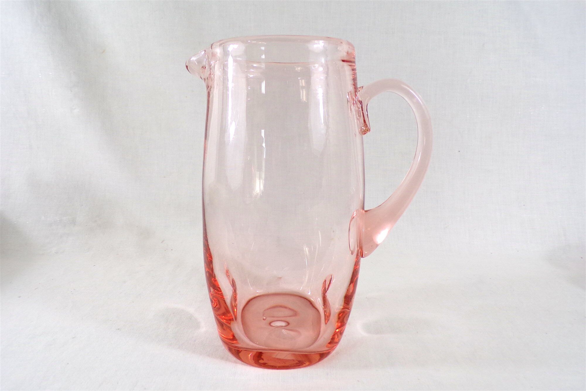 Antique pitcher made of blown glass