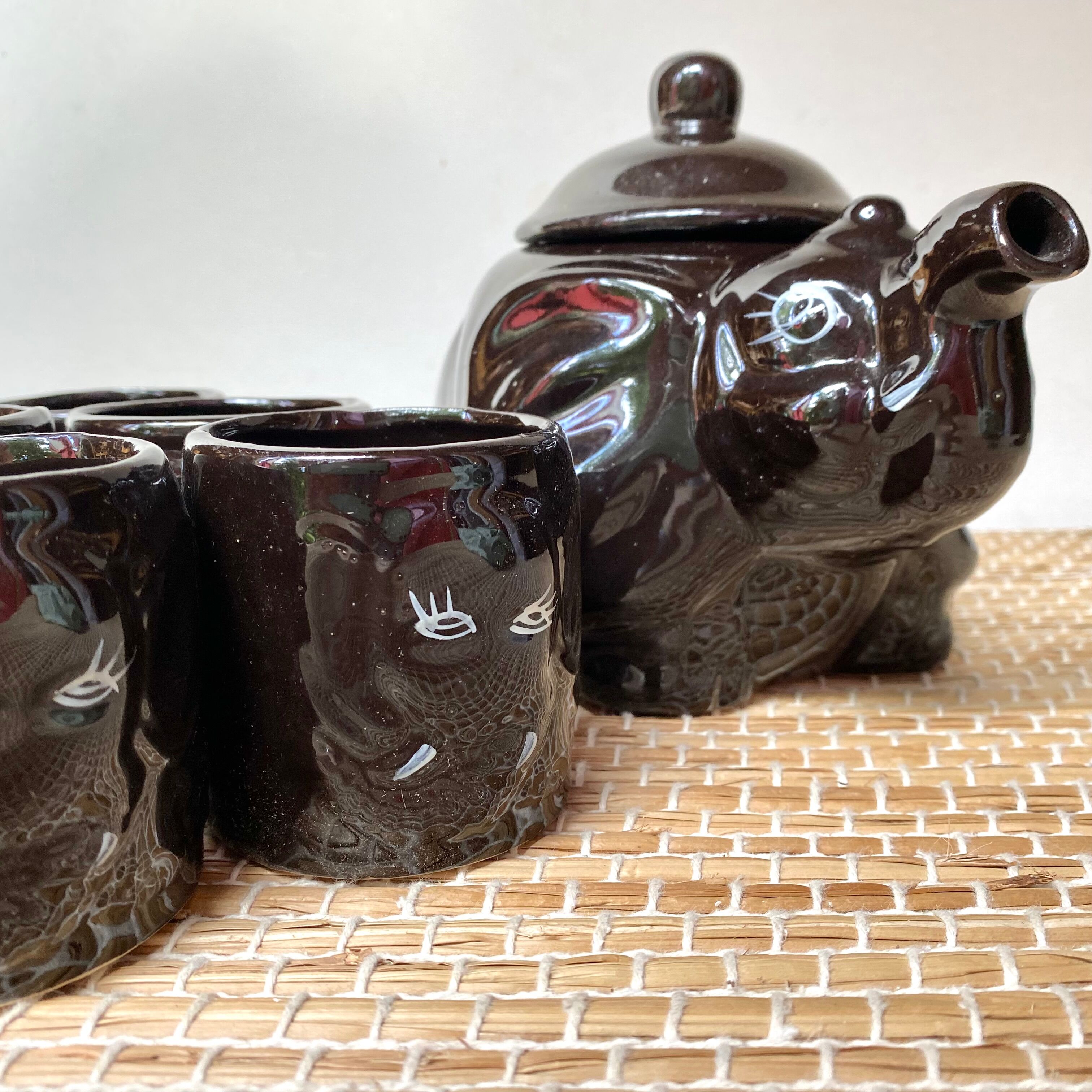 Vintage teapot and vintage elephant cups