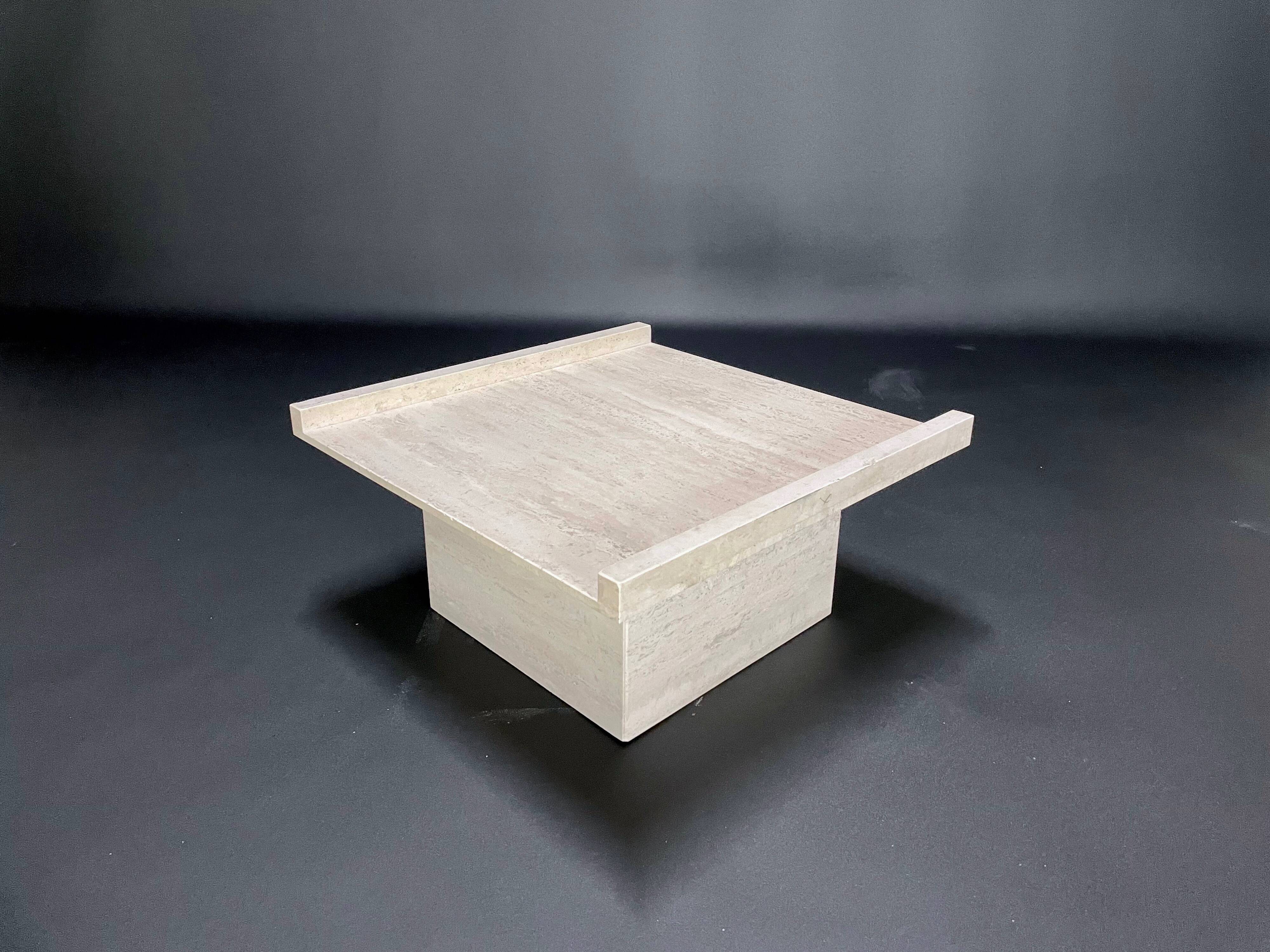 Square travertine coffee table by Claude Berraldacci. 1990s. France.