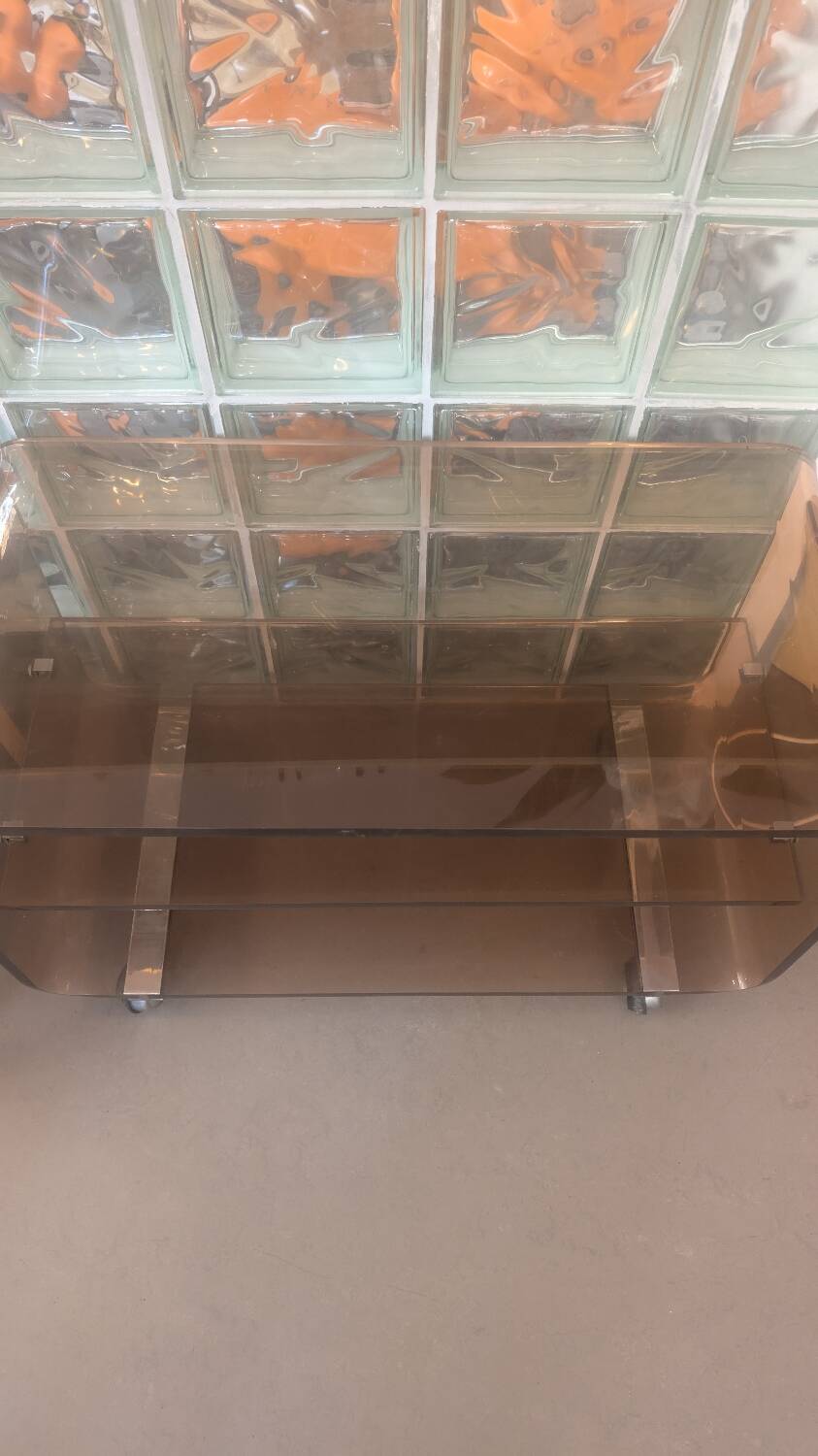 Smoked plexiglass coffee table