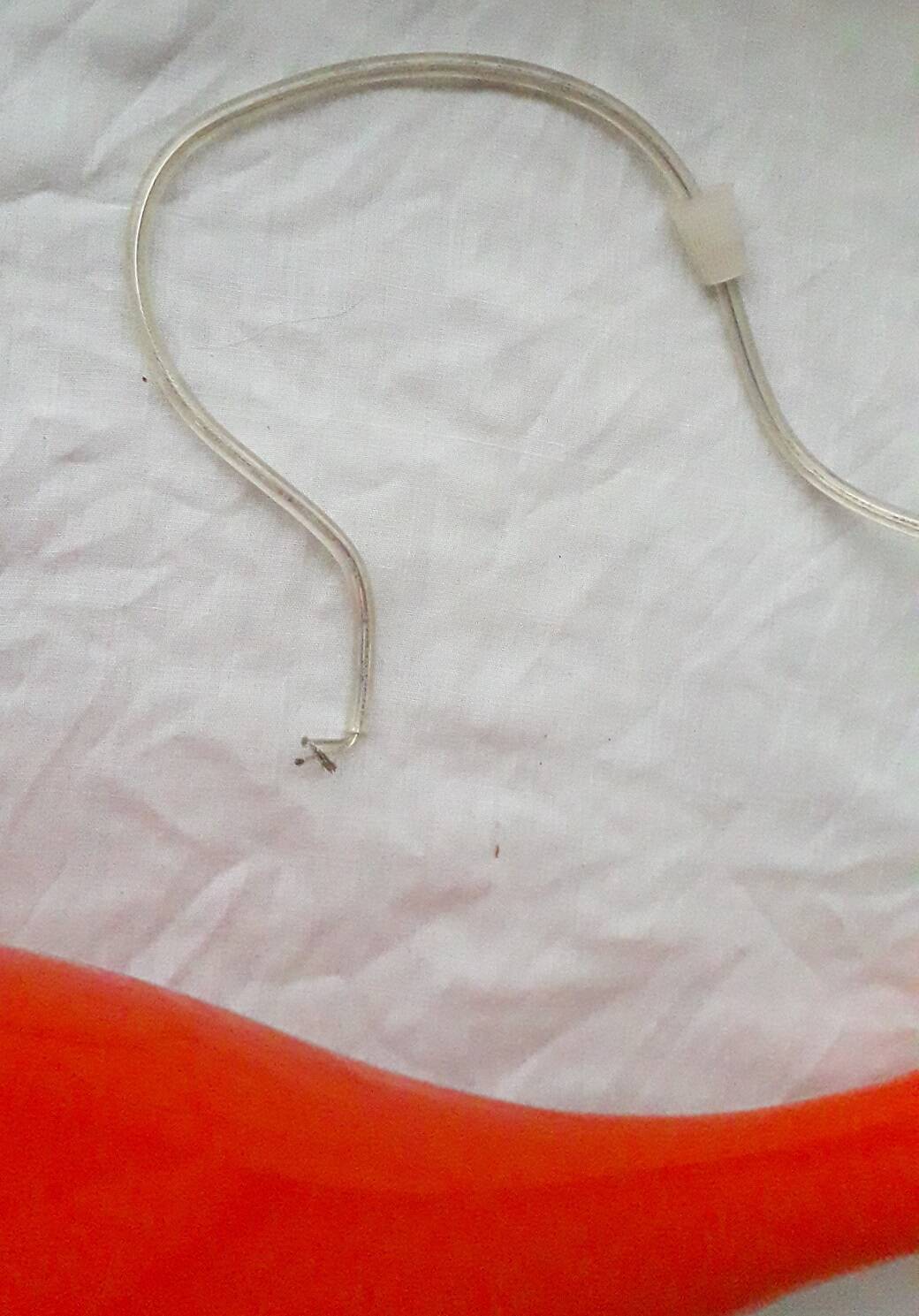 Orange glass suspension