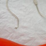 Orange glass suspension