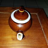 Old used ceramic teapot