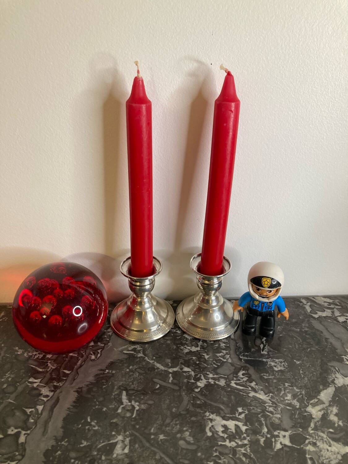 Pair of silver metal candlesticks