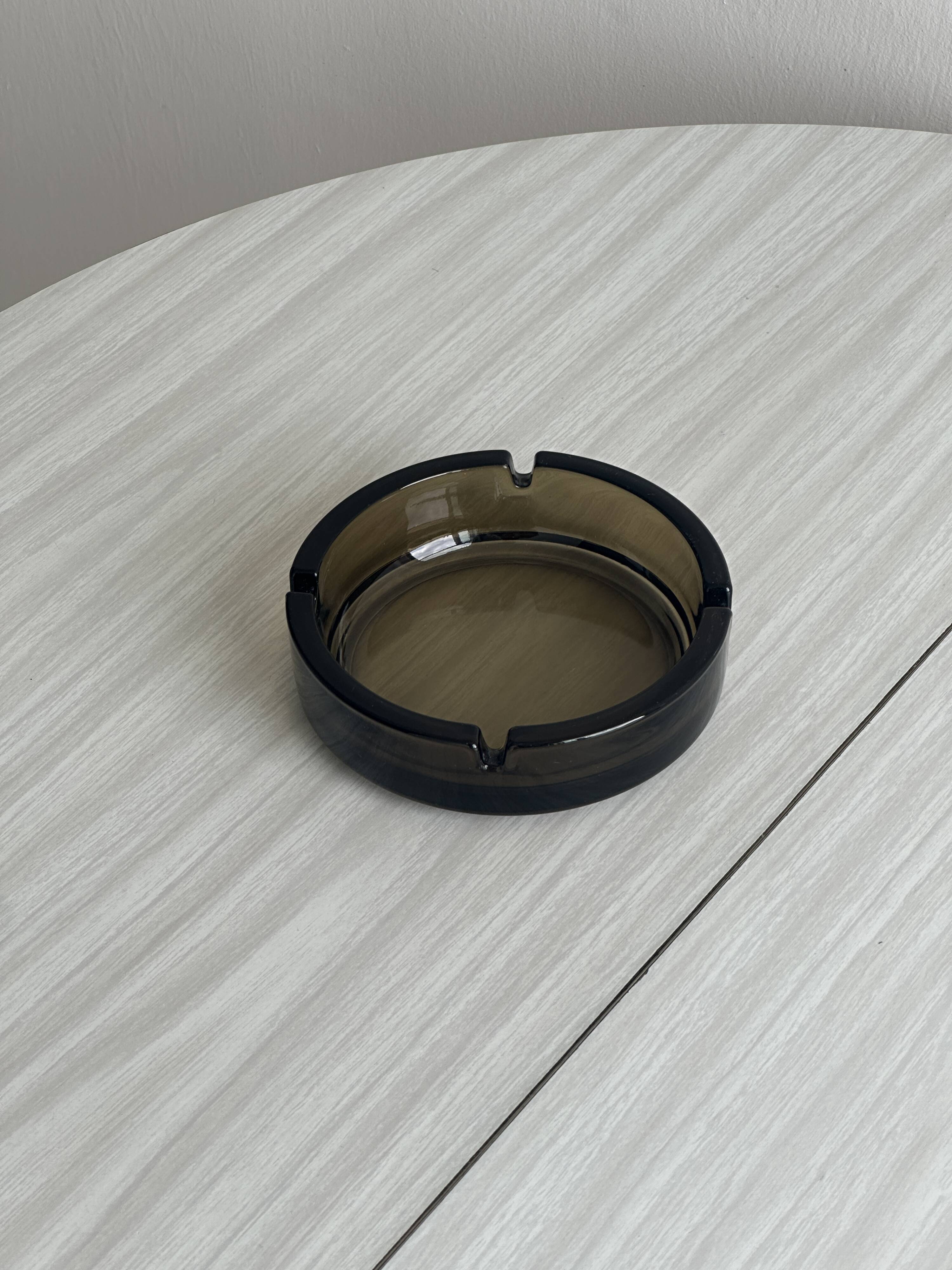 Thick smoked glass ashtray