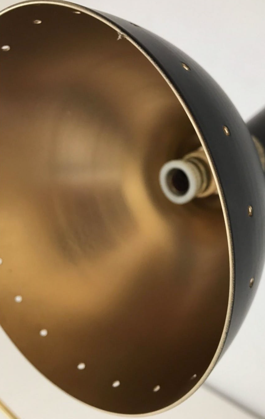 Brass chandelier and black lacquered metal