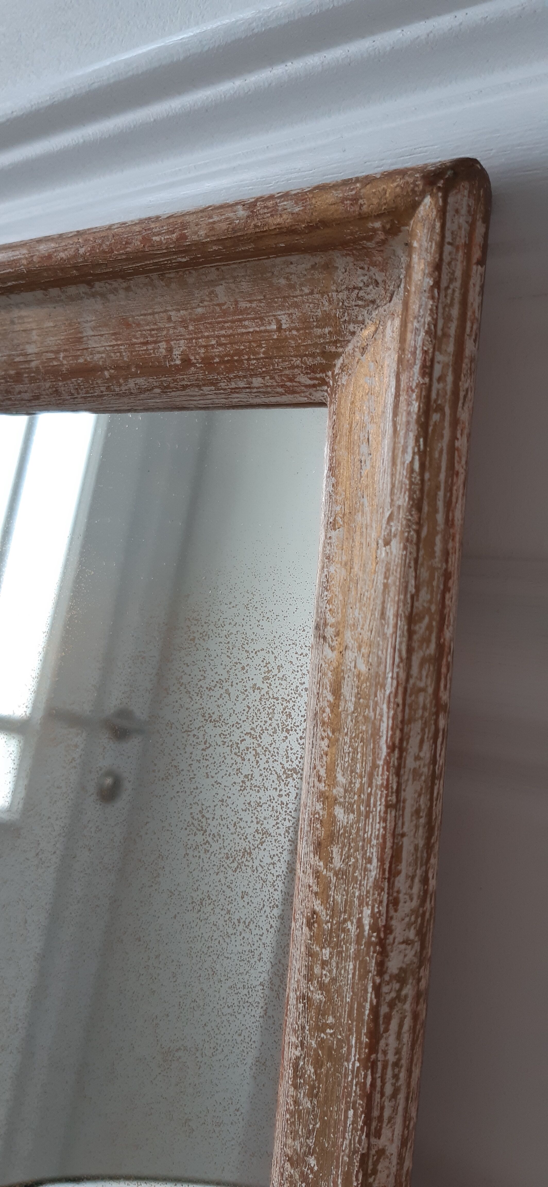 Mirror to be placed or hung in gilded wood