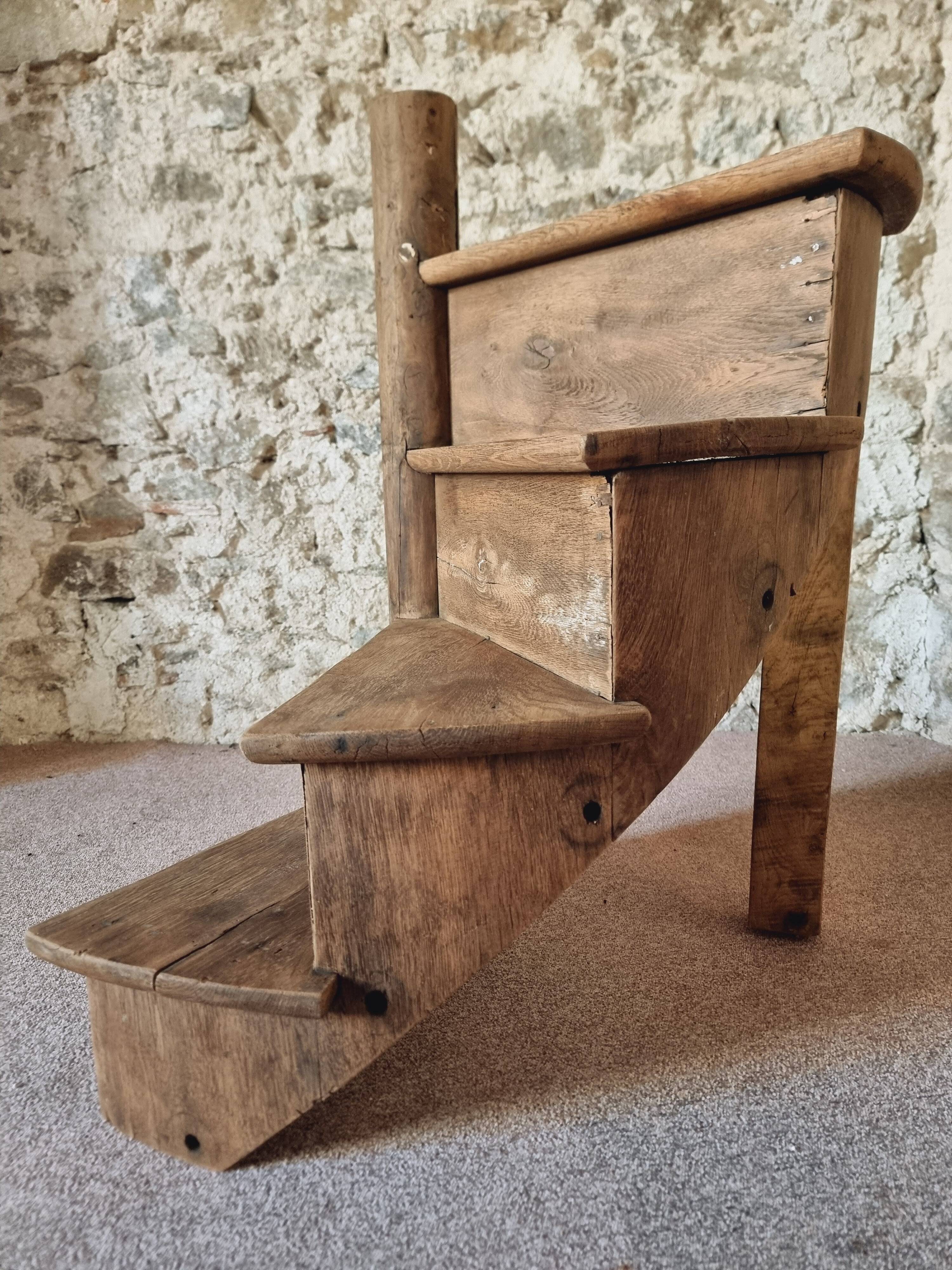 Segment of a spiral staircase in solid oak, early 19th century.