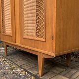Rattan wardrobe and its compass-legged chest of drawers, 1960