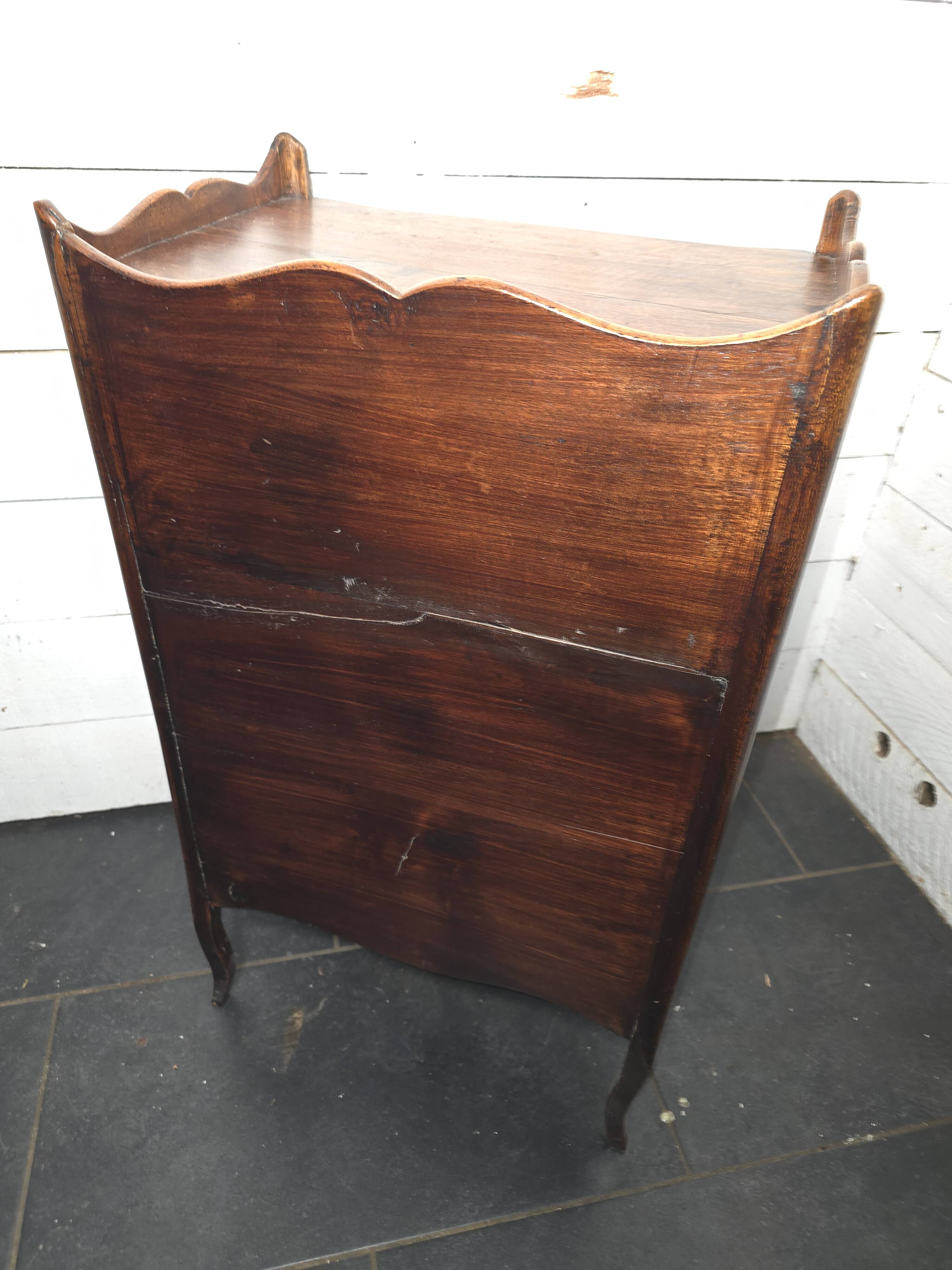 Open library in Louis XV style made of walnut.