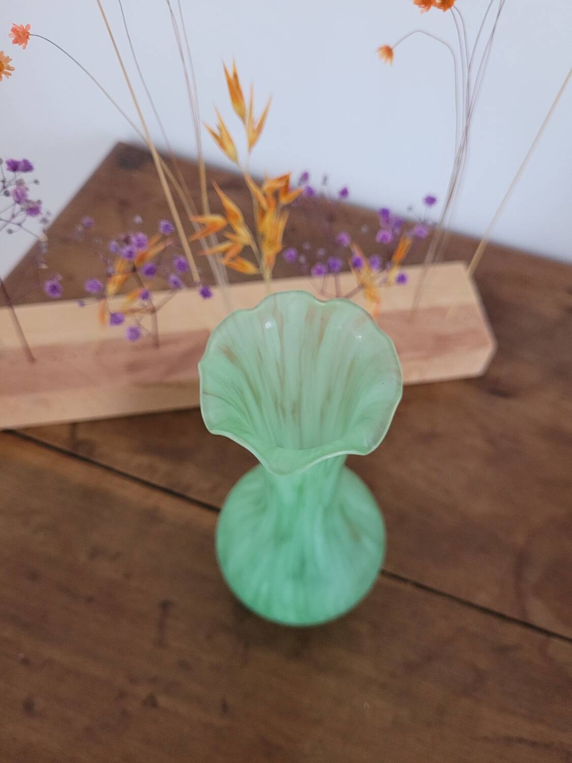 Green vase with high neck made of glass paste