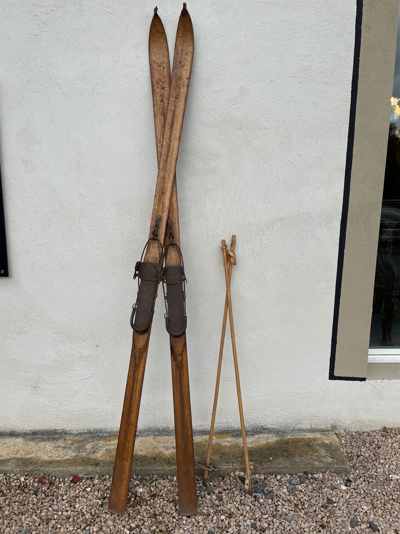 Wooden ski and its sticks