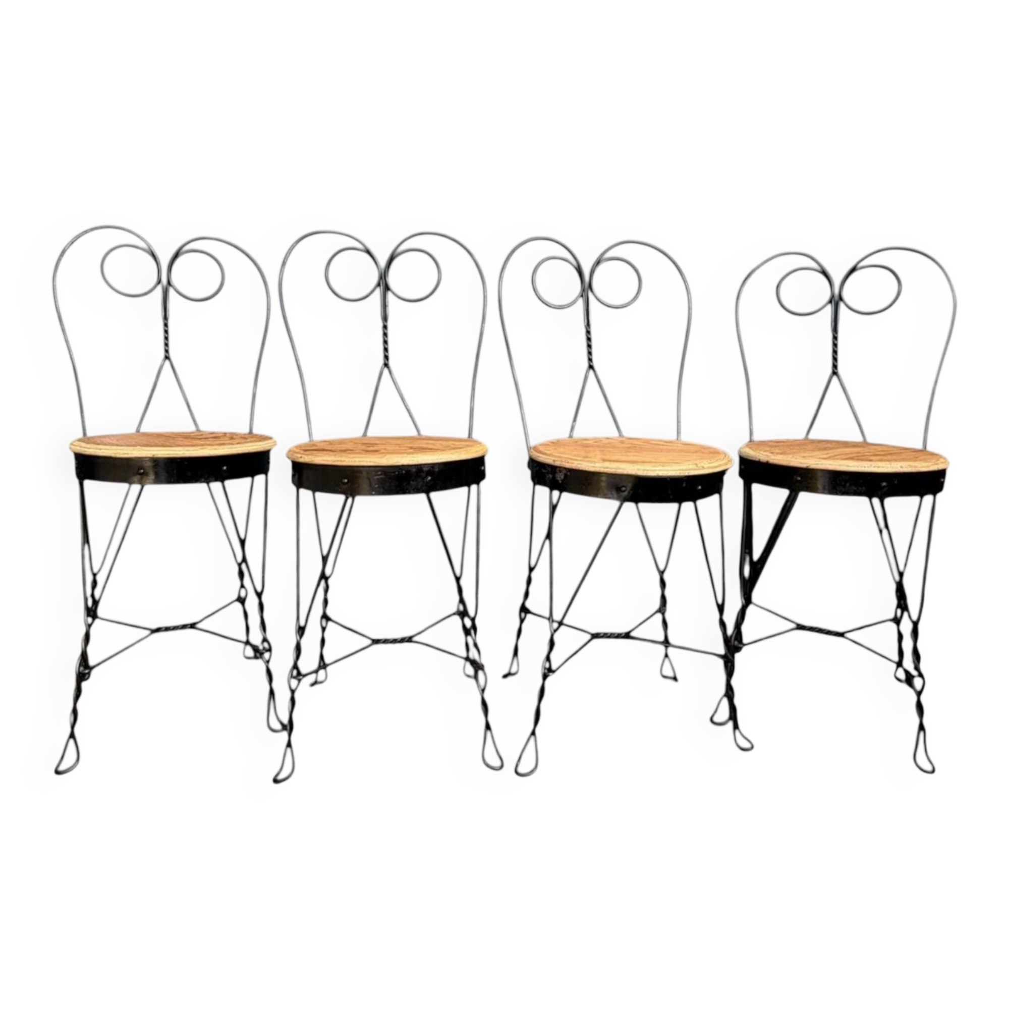 Set of 4 vintage wrought iron chairs from the 1940s.