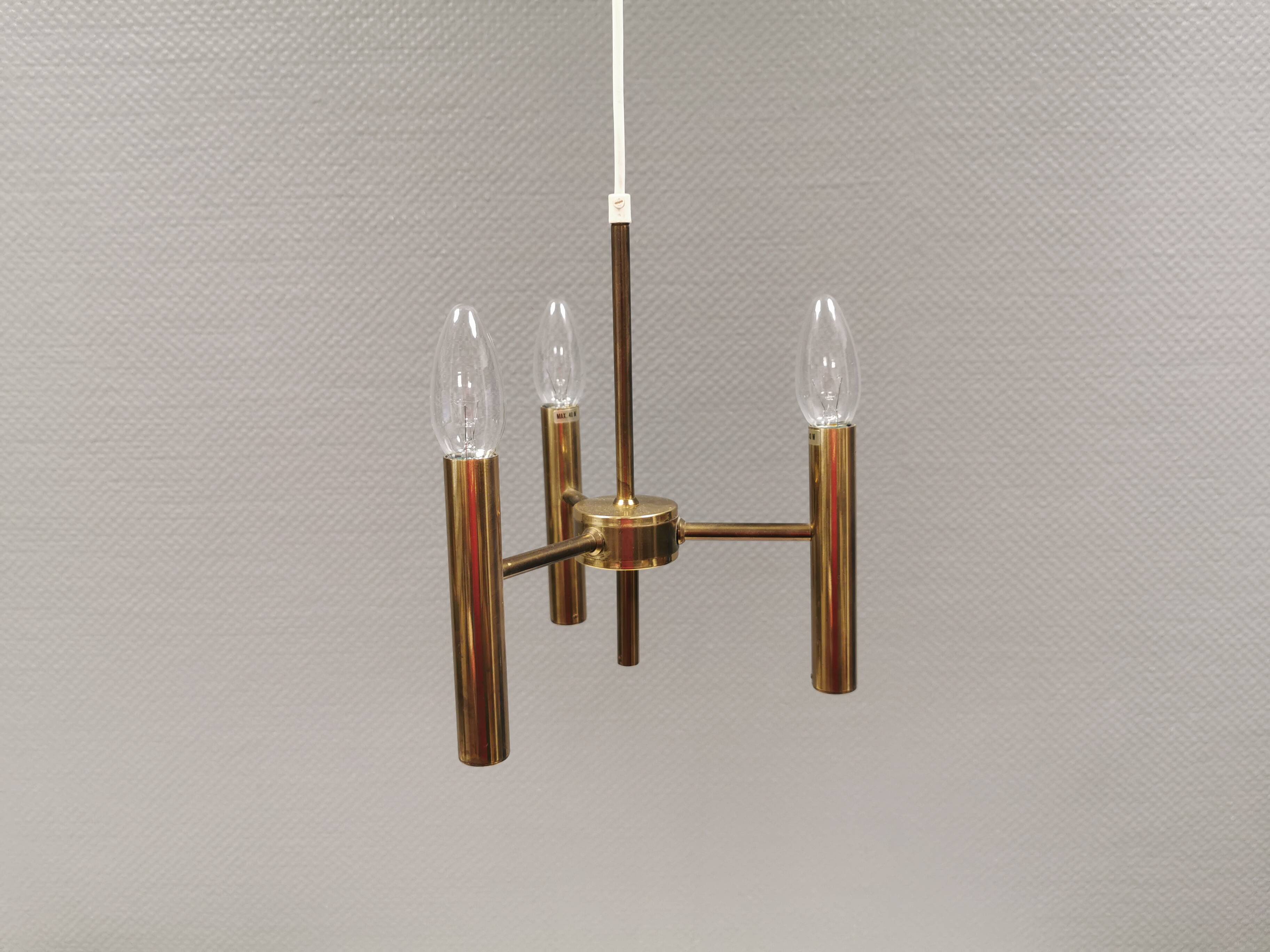 Chandelier with 3 light sources, made of metal and brass. 1960-70s