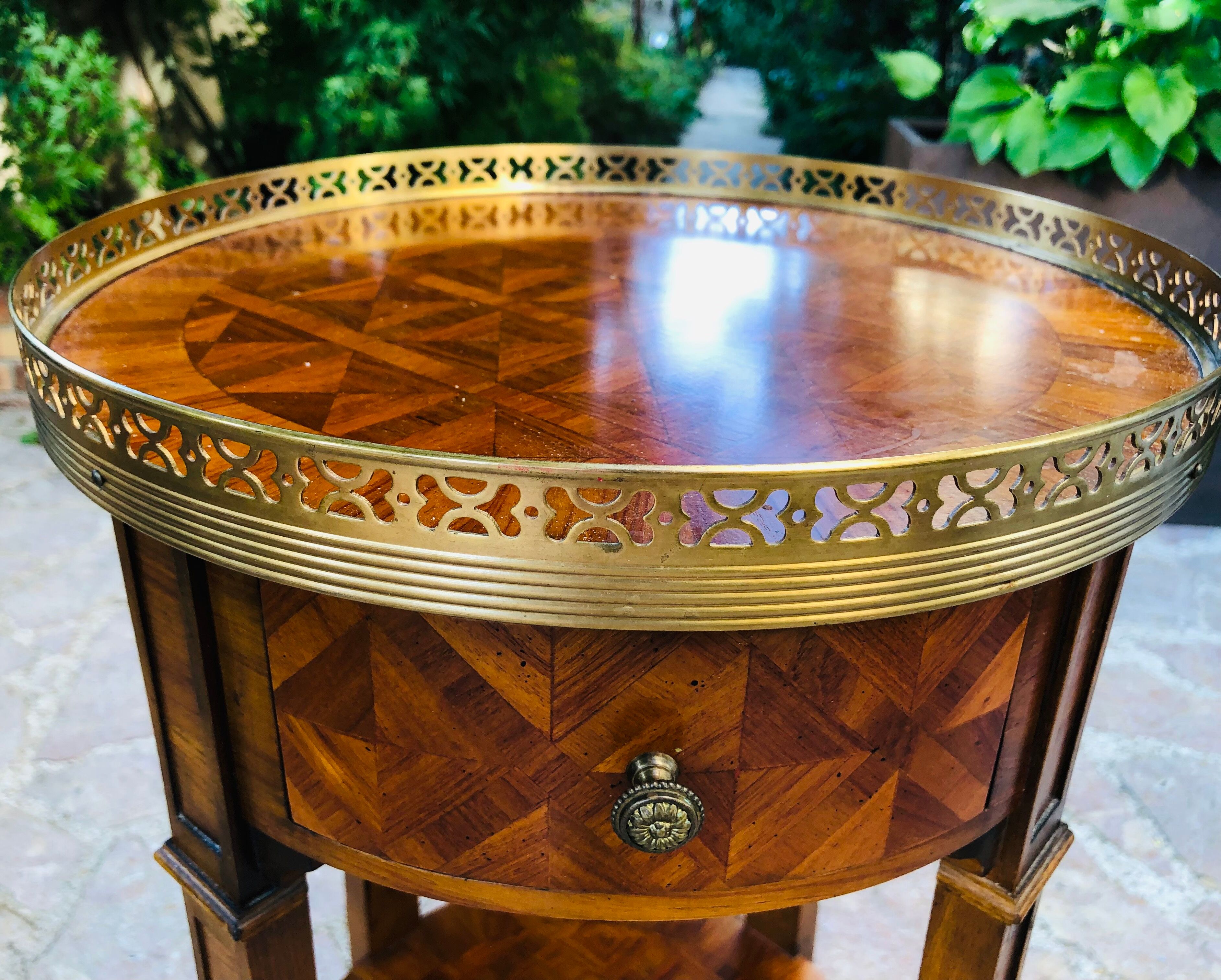 Quadripod bedside table in Louis XV style marquetry