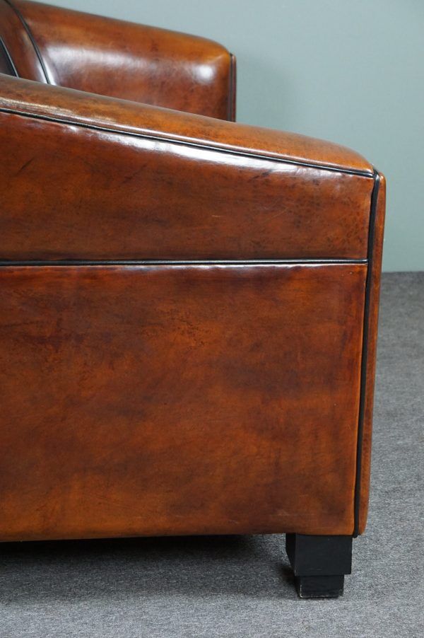 2.5-seater art deco style sofa in sheepskin