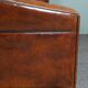 2.5-seater art deco style sofa in sheepskin