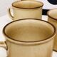 Cup in beige sleads