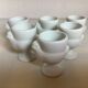 Six white hen egg cups
