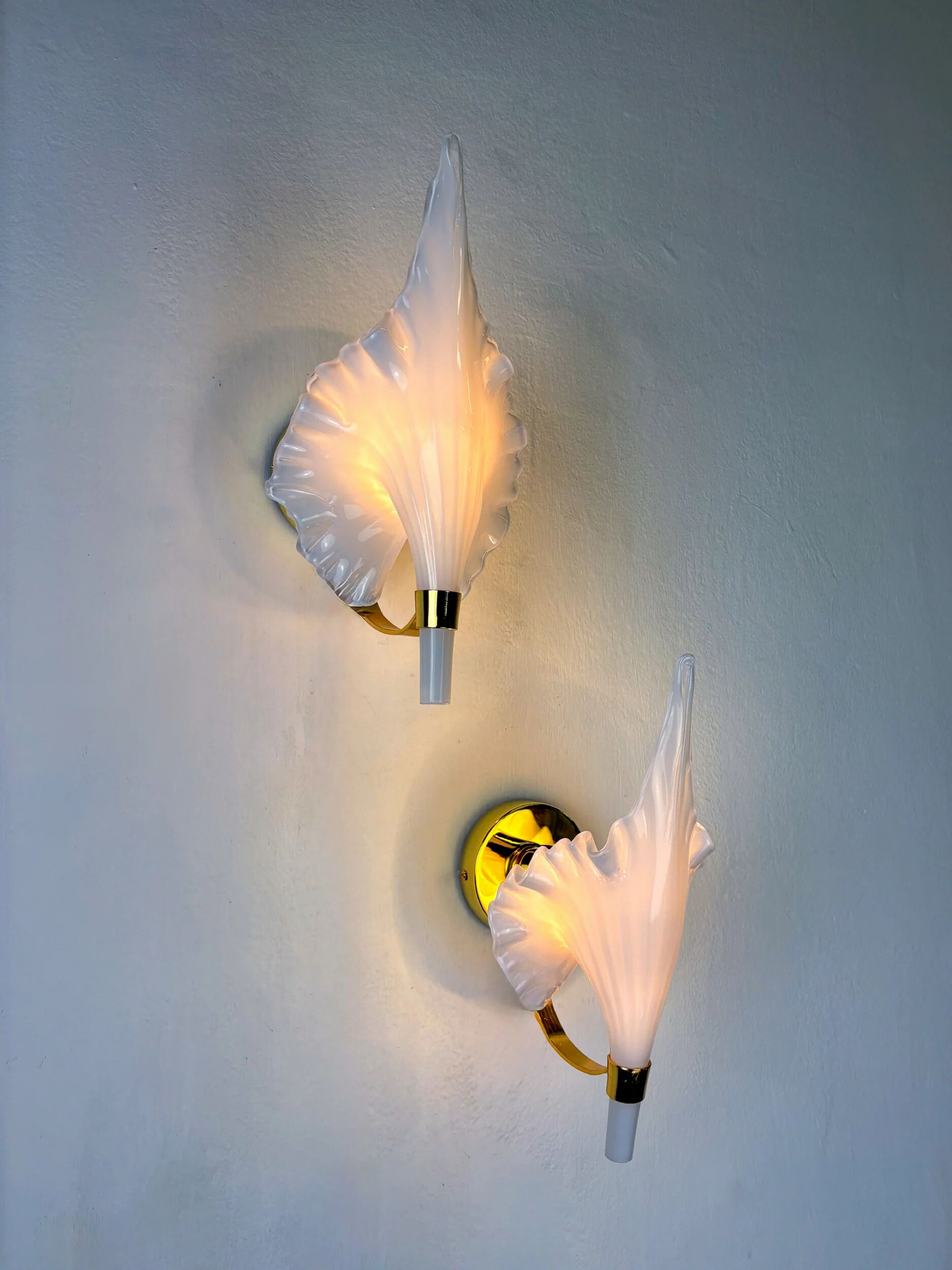 Pair of "Calla Lily" leaf-shaped wall sconces, Murano glass & gilt brass, Italy, circa 1970s