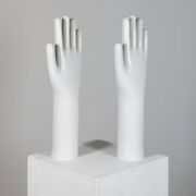 Pair of authentic vintage jewellery displays in industrial porcelain representing hands.