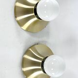 Stilux Milano, vintage round gilded aluminum wall lamps from 60s. Set of two