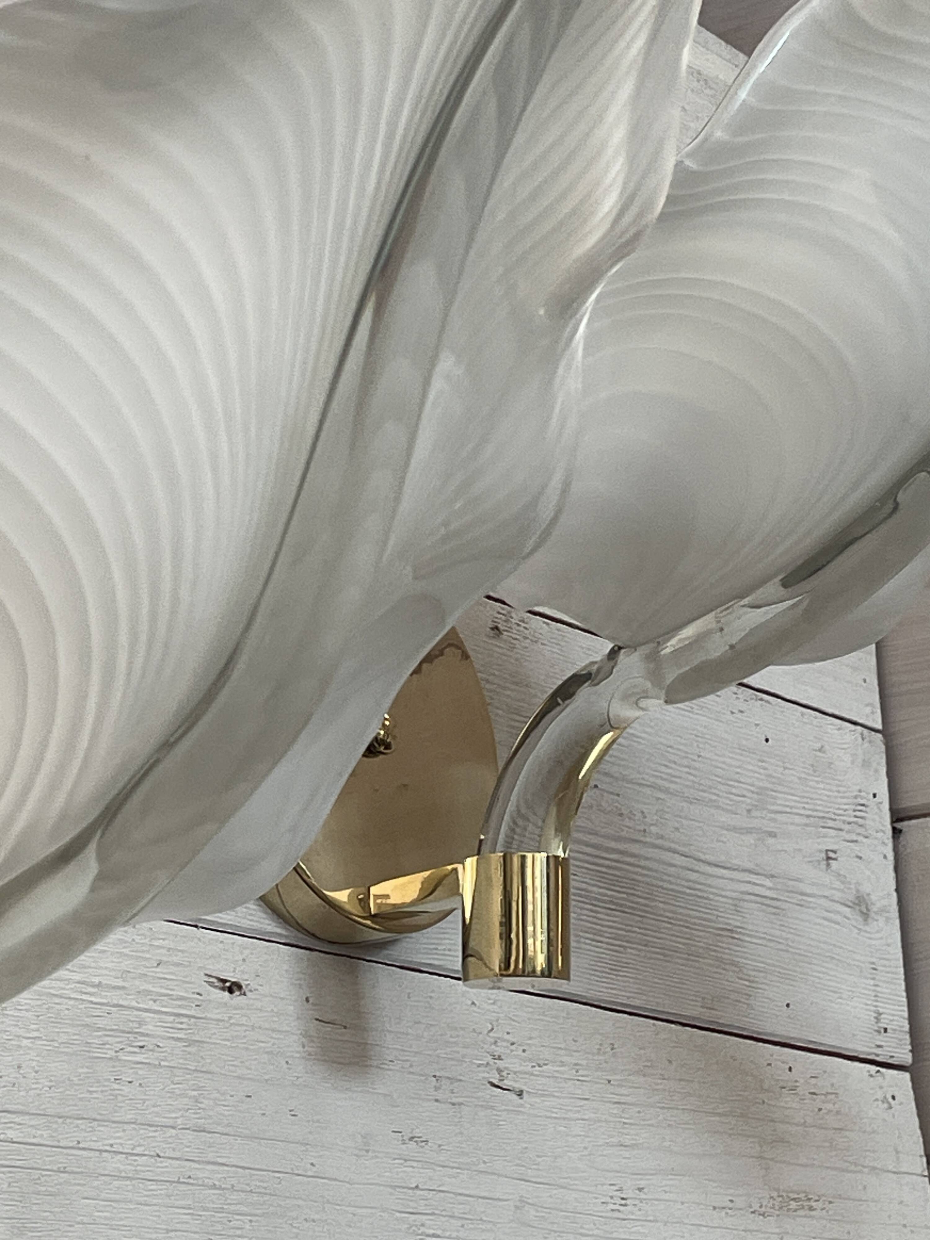 Set of 3 Murano glass wall lamps in white and brass, 1970s.