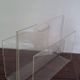Vintage magazine rack in transparent plexiglass from the 1970s.