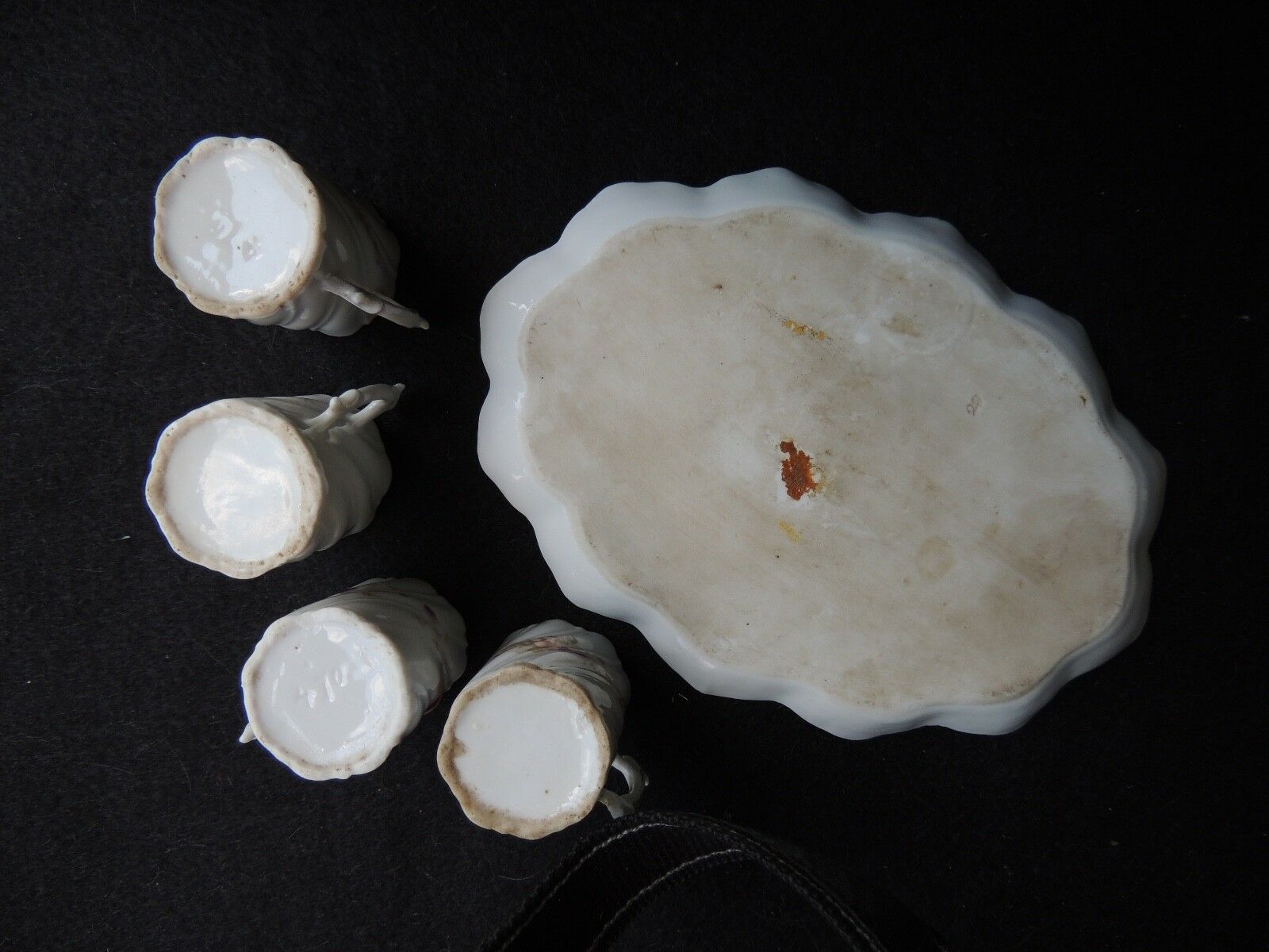 Tray and 4 small porcelain cups around 1900