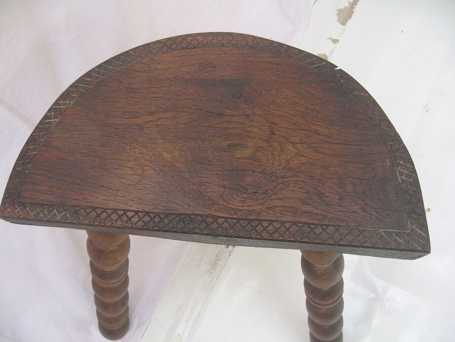 Wooden tripod stool